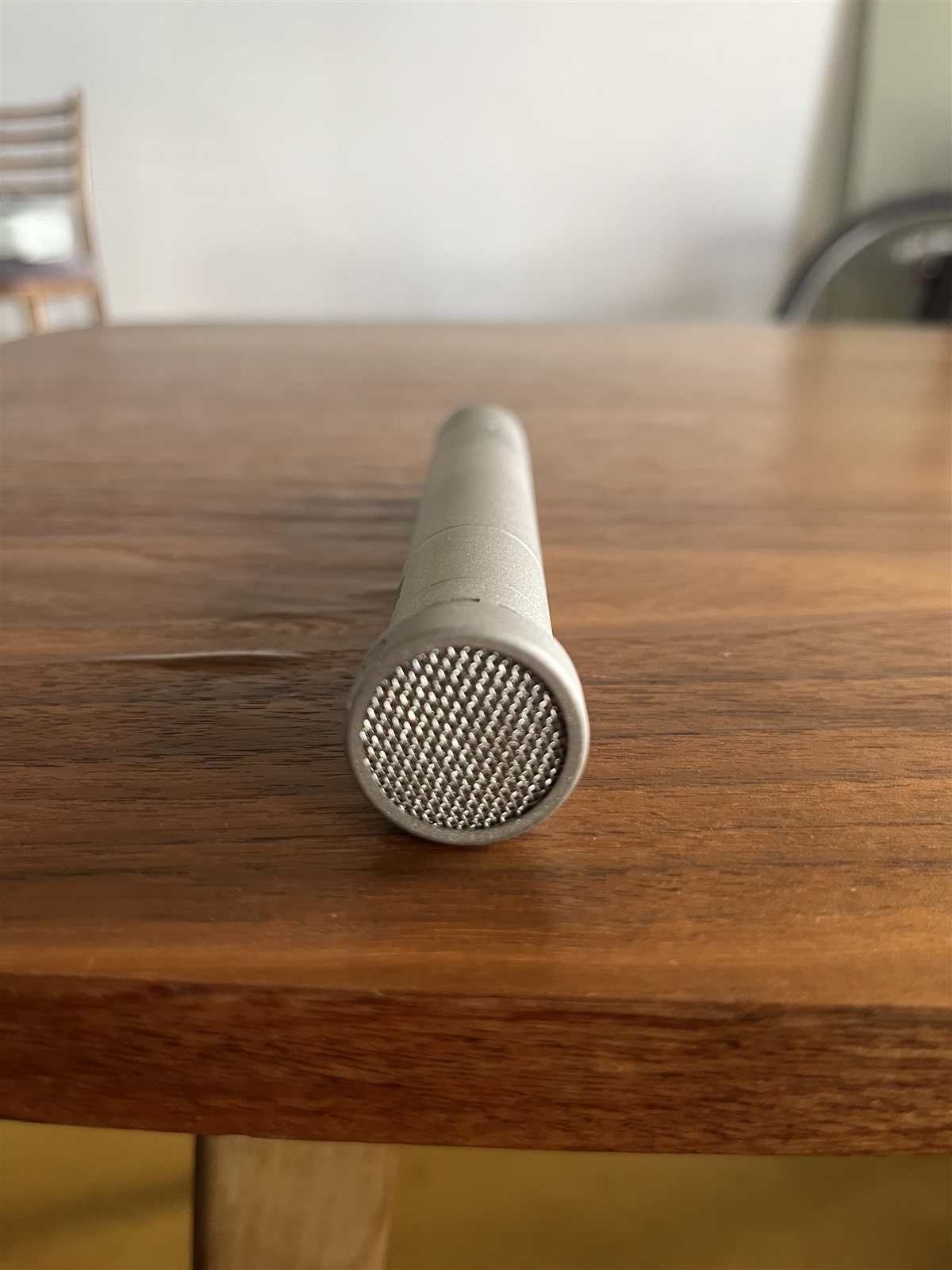 Close-up of an Oktava MK-012 small-diaphragm condenser capsule.